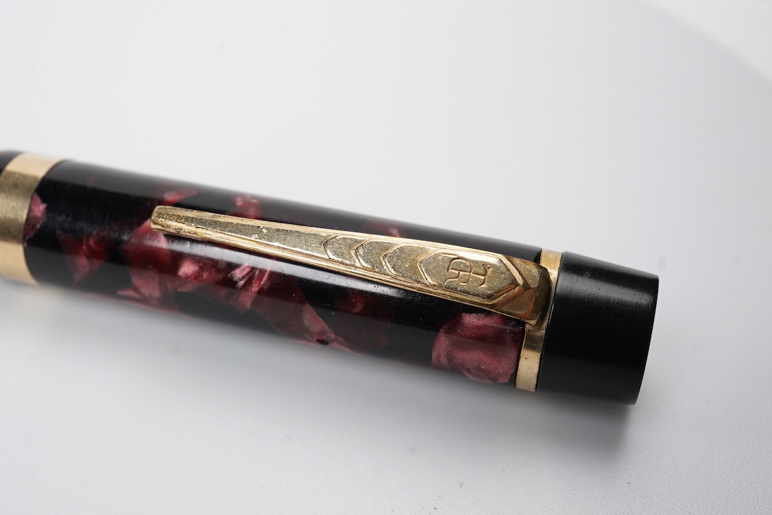A De la Rue Onoto No.6234 piston fill fountain pen (working condition) in burgundy/black with DLR Onoto No.5 nib
